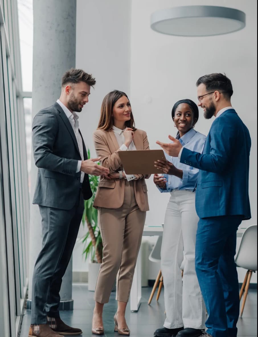 Inspire Management team collaborating in a modern office